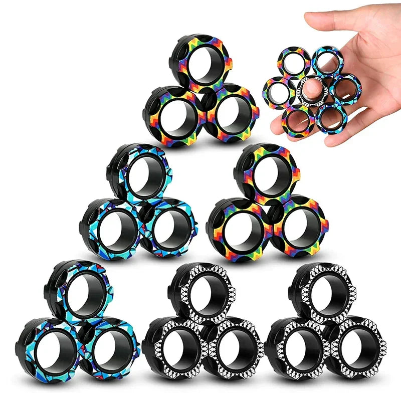 Colorful magnetic rings fidget toys in various patterns, hand holding one set