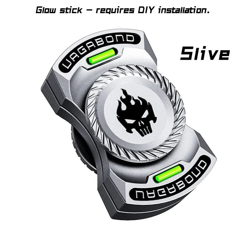 Silver metal fidget spinner with glow stick, skull flame design, and Vagabond text.