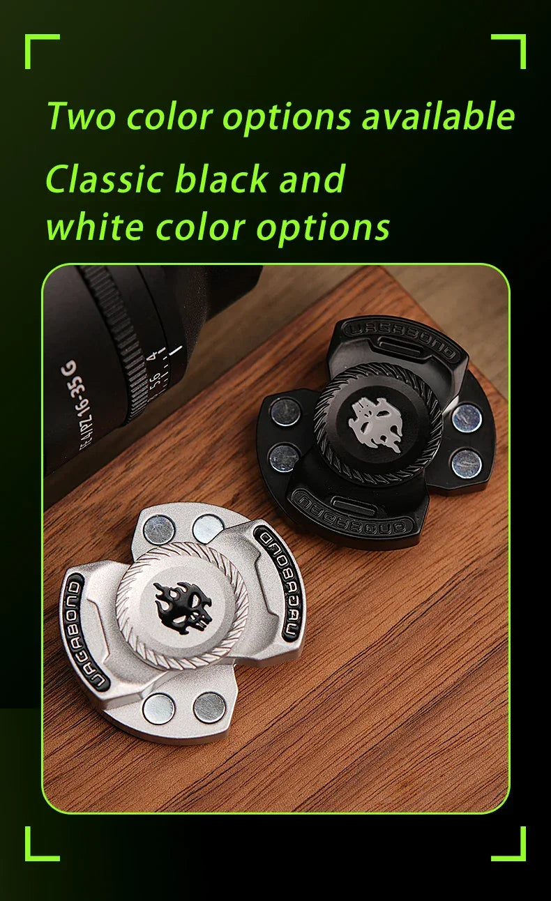 Black and silver metal fidget spinners on wooden surface, classic color options.