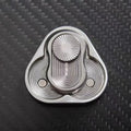 Metal fidget spinner with engraved geometric patterns on carbon fiber surface