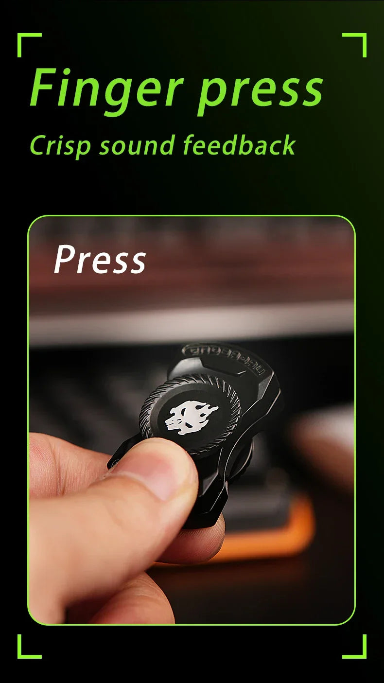 Hand pressing black fidget spinner with skull design, crisp sound feedback demonstration